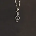 Musical Note Charm Locket (संगीत चार्म लॉकेट)