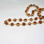 Golden Rudraksha Mala (गोल्डन रुद्राक्ष माला)