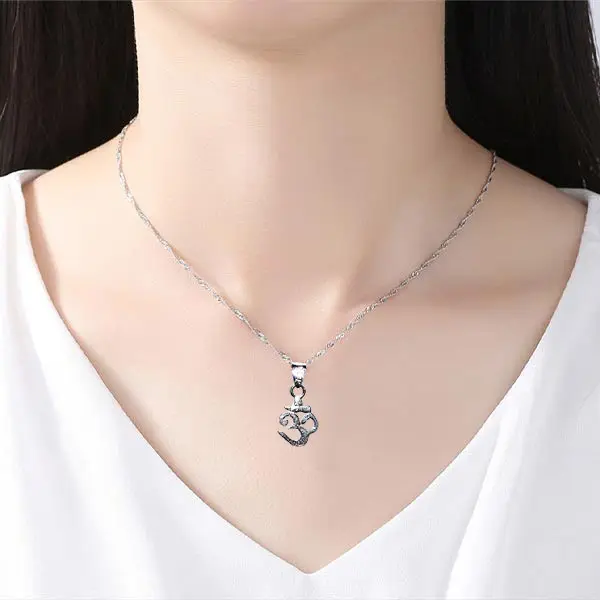 Om symbol lockets on sale